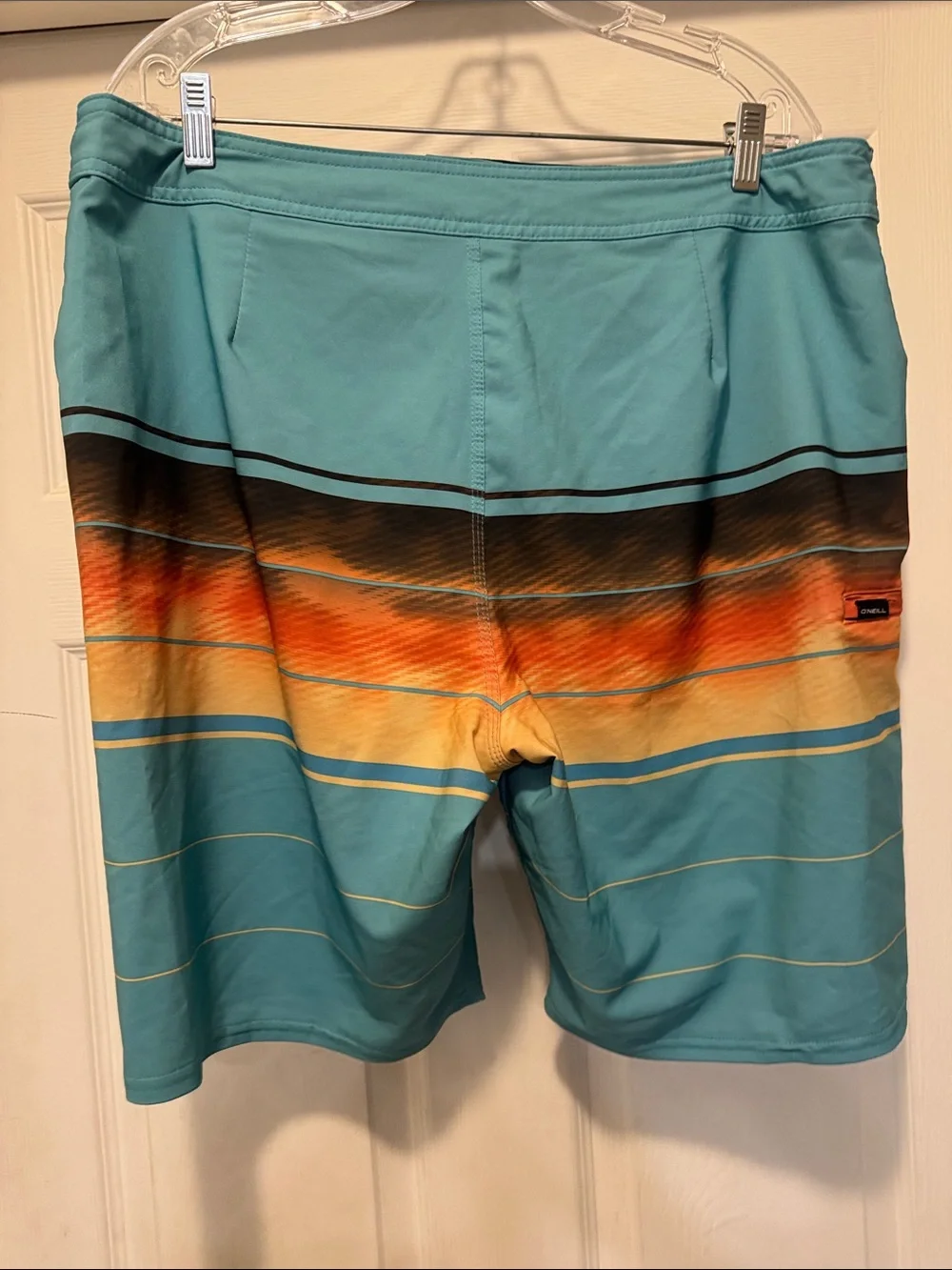 O'Neill Blue and Orange Striped Board Shorts